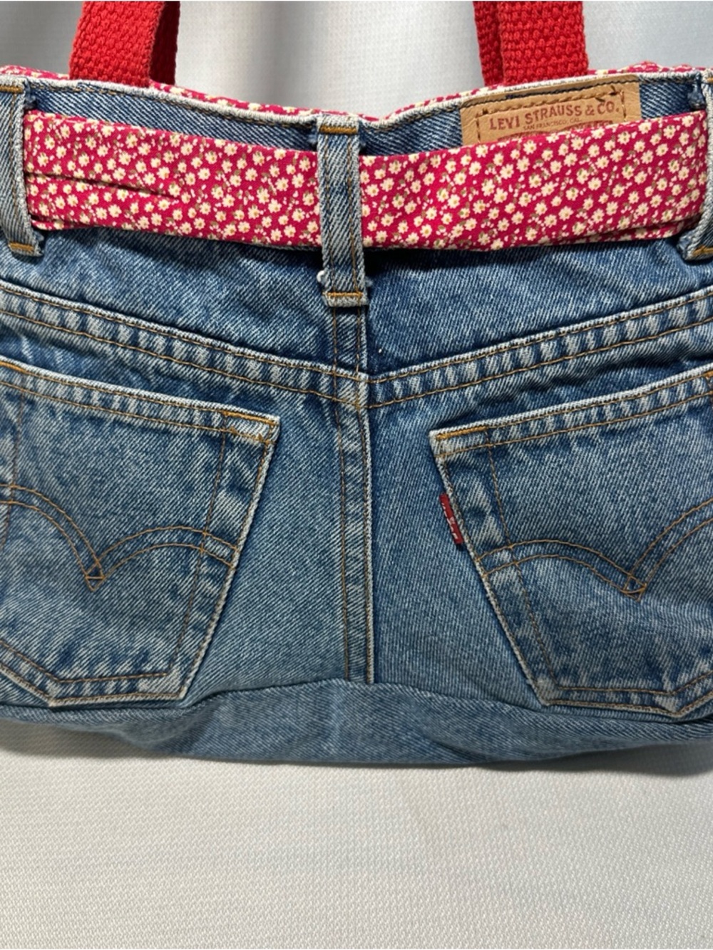 Levi's Denim Shoulder Bag with Red Floral Bow and Red Straps - Picture 3 of 7
